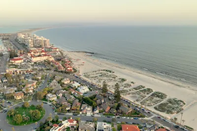 Aerial of Coronado Beach with the sand dunes that spell out Coronado